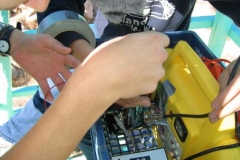 15_154attaching-transmitter-to-solar-battery-laura-kleger-photo